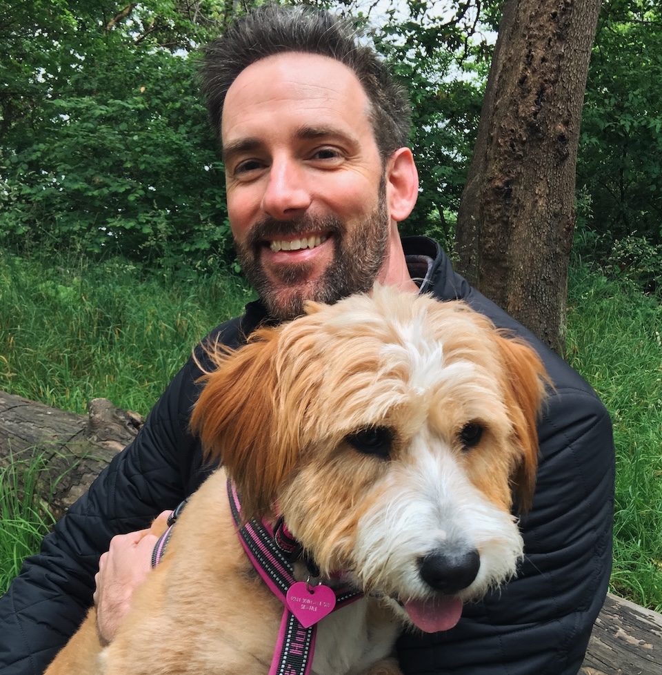 Image of Kerry Usry with Luna the pup
